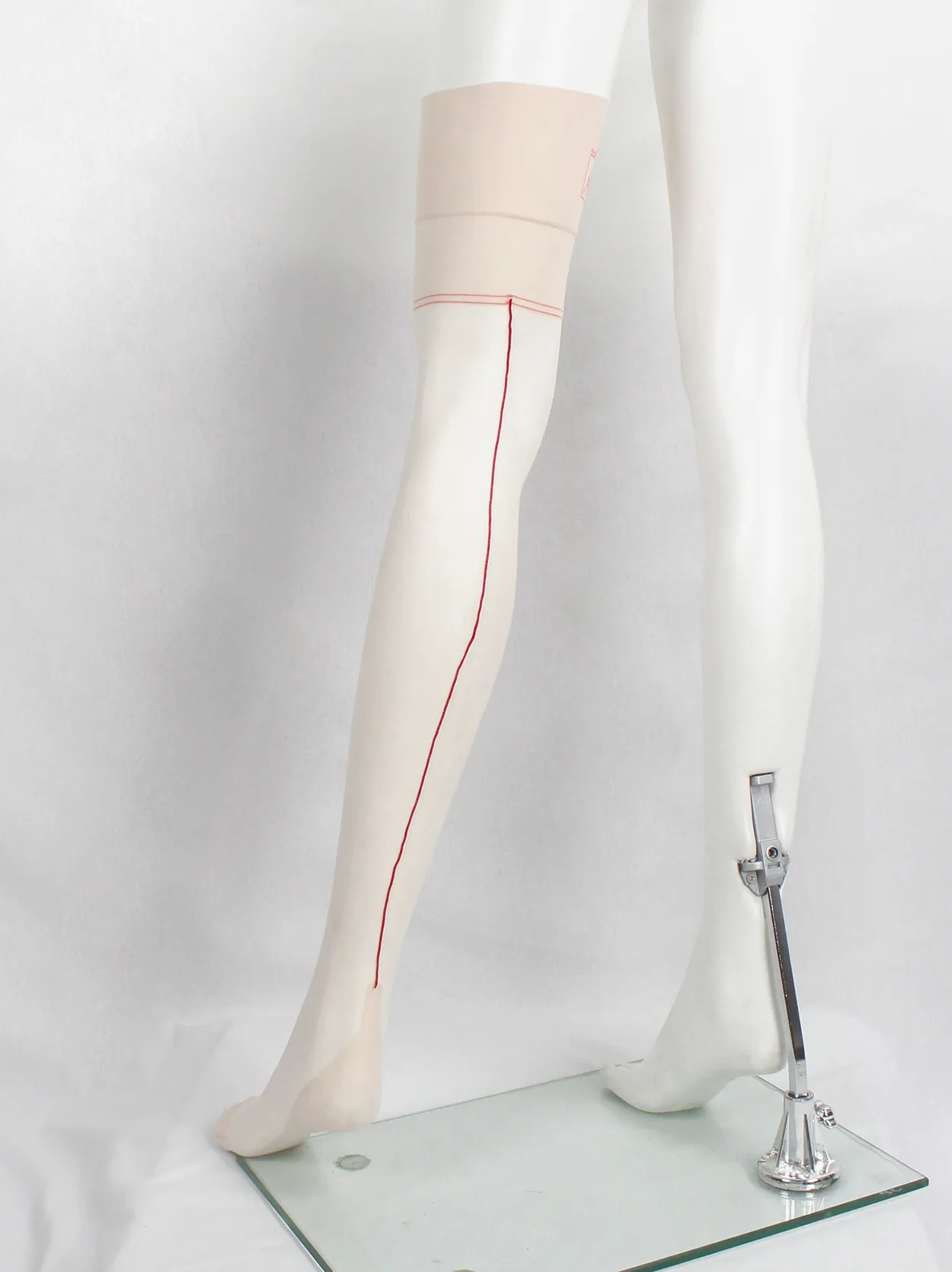 A.F. Vandevorst Nightfall blush pink stockings with red back seam — spring 1999