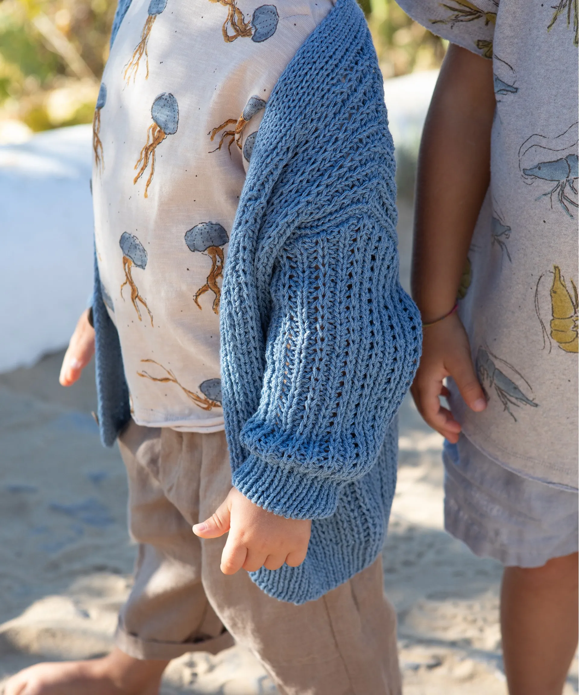 Chaqueta de punto tejido con cuello de pico | Textile Art